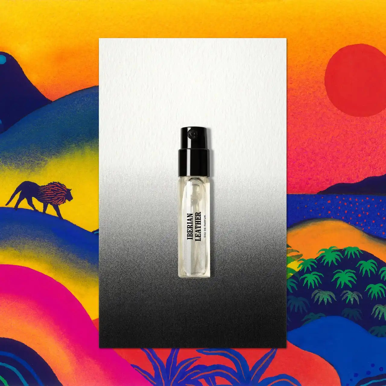 Clear perfume sample with black cap.