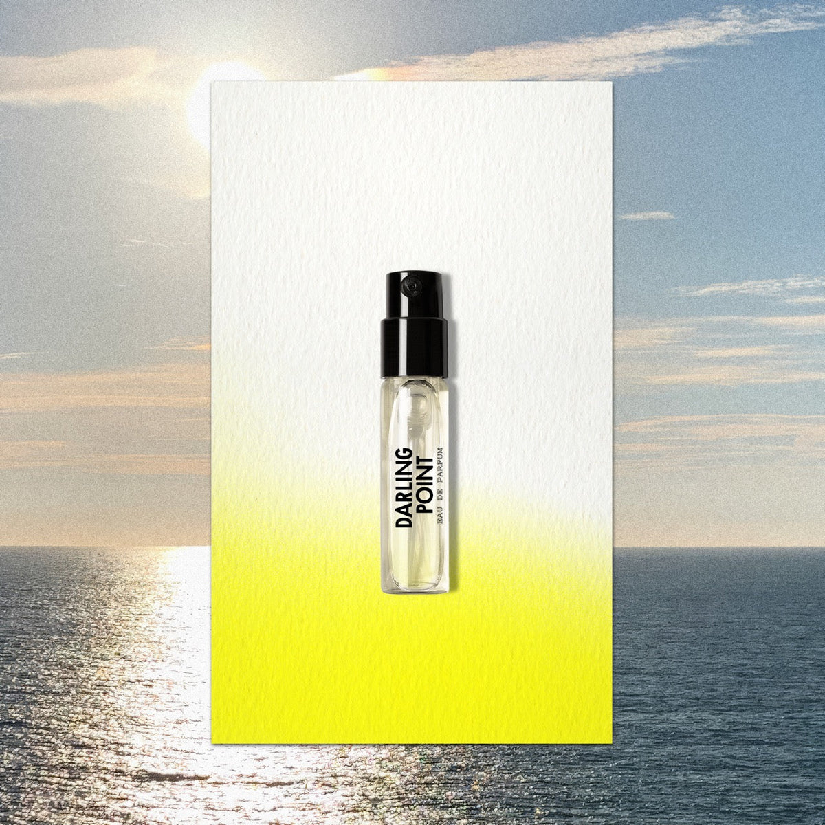 Clear glass travel spray bottle with black cap and minimalist darling point branding containing light fragrance for portobello road — vue alternative