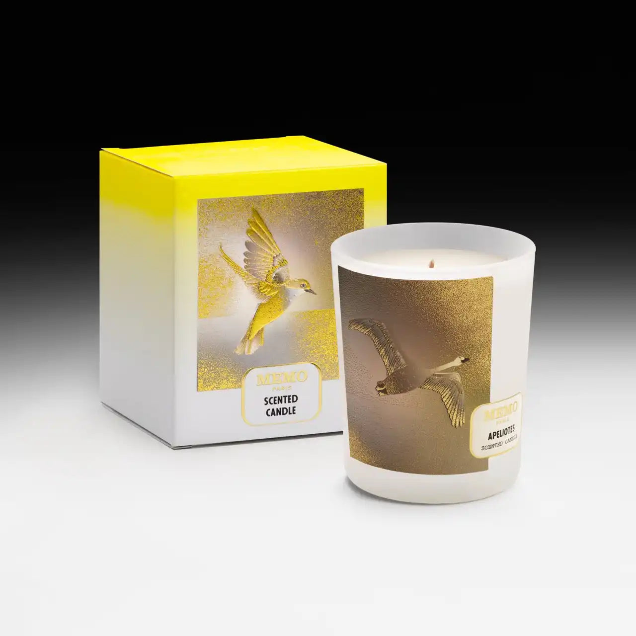 Scented candle with bird design.